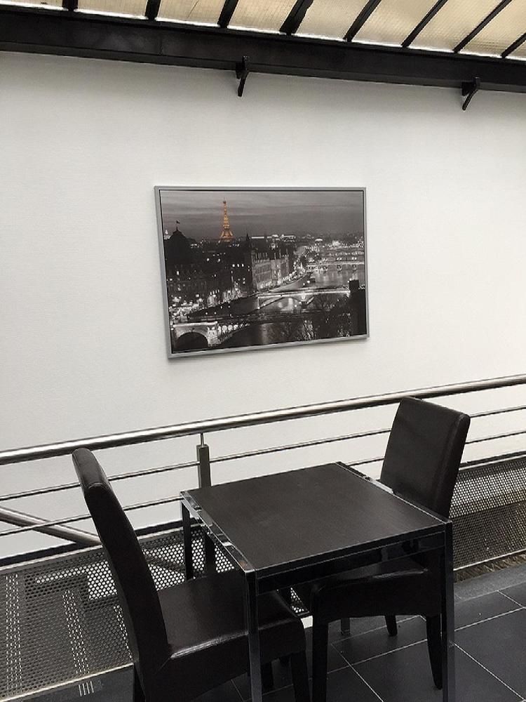 Hotel Moderne Maisons-Alfort Exterior photo A photograph of Paris, France, on display at the National Museum of the United States Army